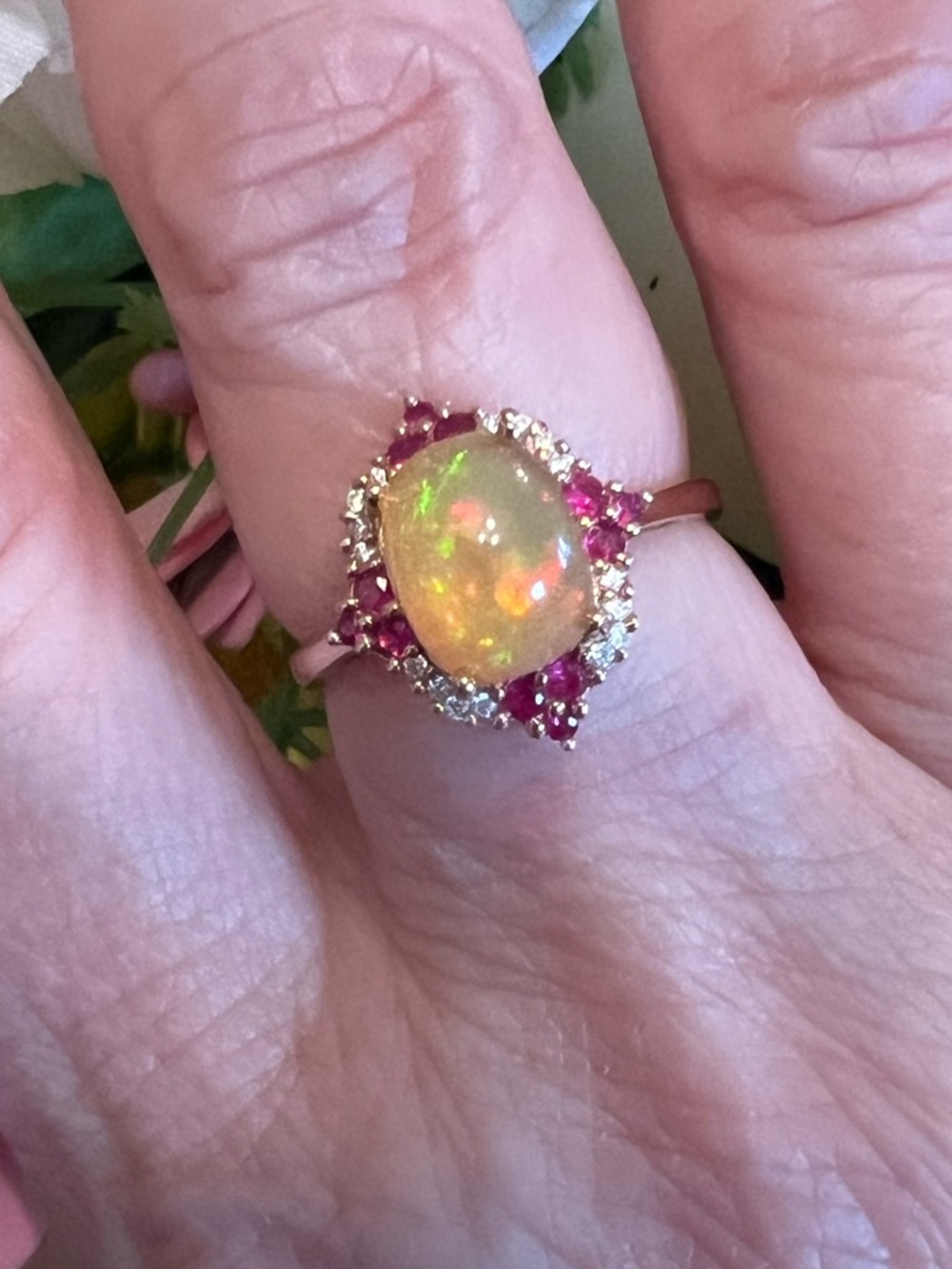 10k Solid Rose Gold Ethiopian Opal with Genuine Diamond and Ruby Halo Ring